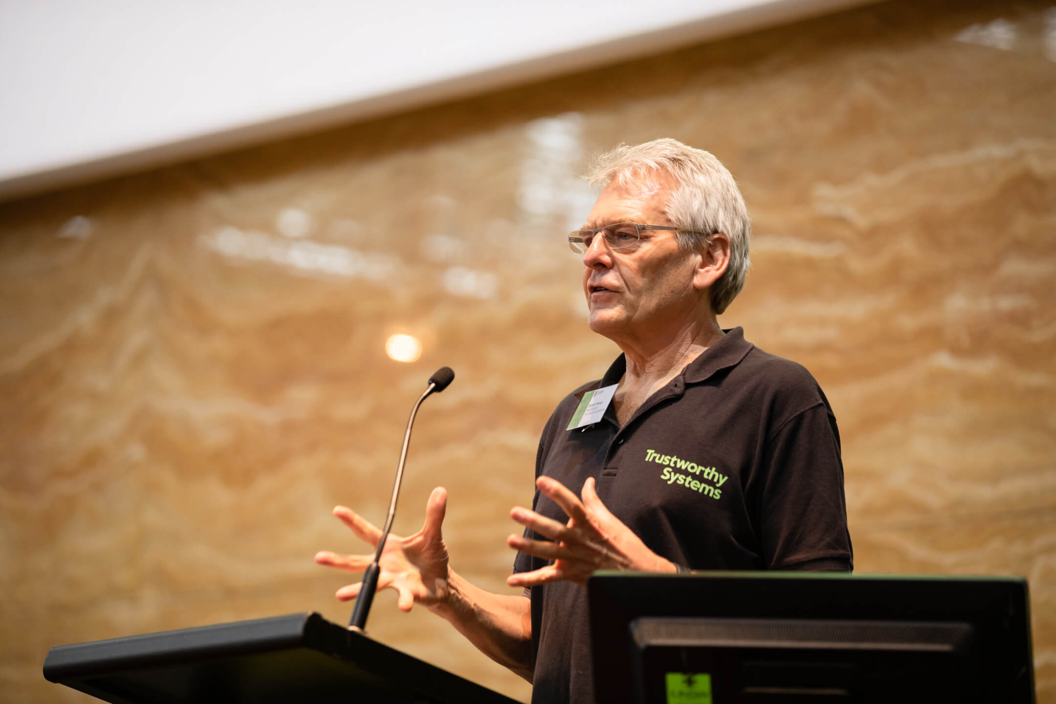 Gernot speaking at the UNSW CSE Expo in October 2022